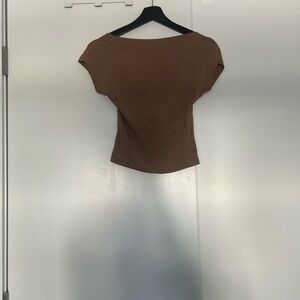 Warm brown backless top with sculpted backline